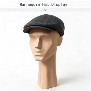 Geometric wooden male mannequin head with vintage flat cap